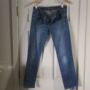Medium Washed Distressed Skinny Leg. Size 6 Thick Stitching